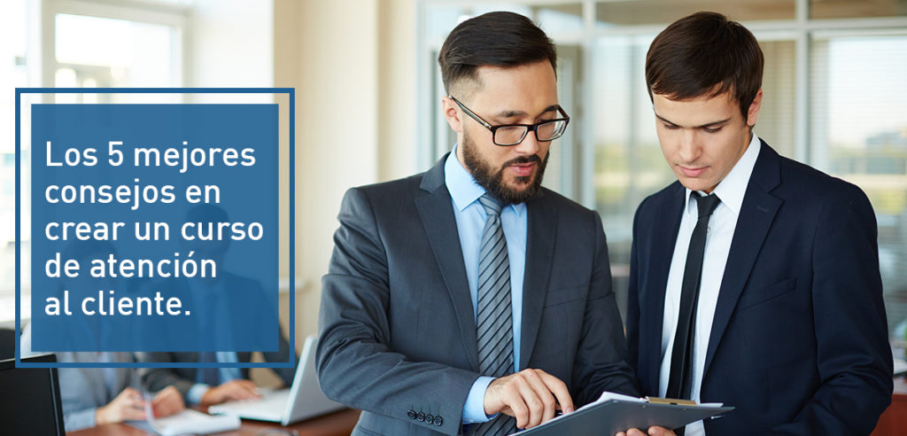 Confident businessman pointing at document while explaining his idea to his partner on background of their colleagues